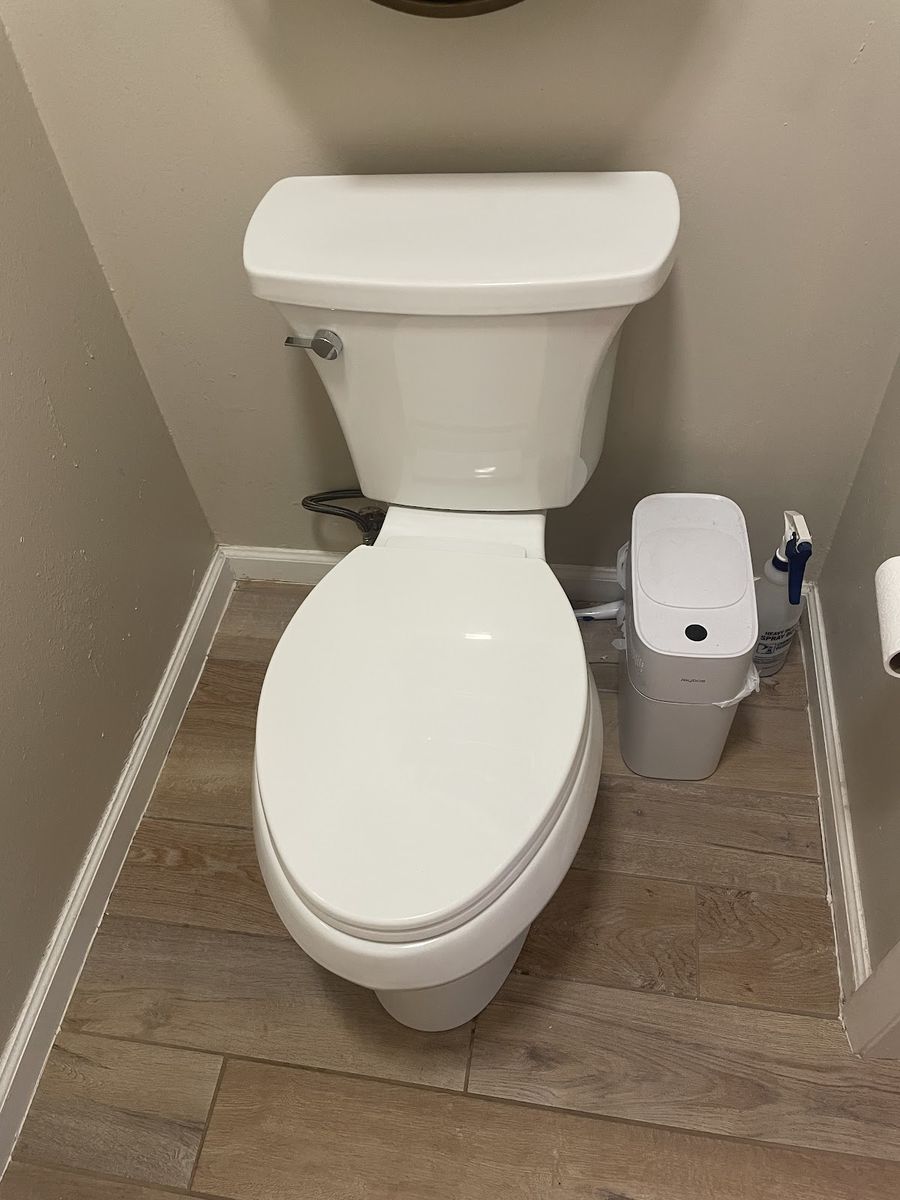 New toilet installed in a residential bathroom