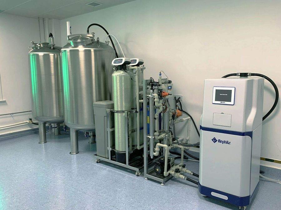 Water filtration and softener equipment with connected tanks